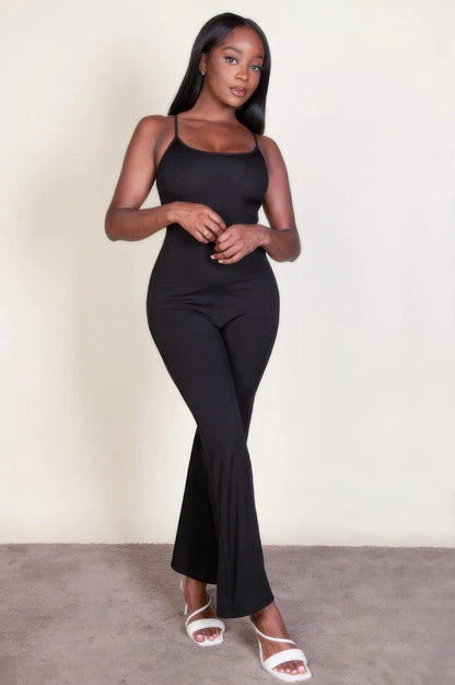 Ribbed sleeveless wide leg jumpsuit, this sophisticated piece features a soft, medium-weight rib knit fabric that provides a perfect blend of comfort and style