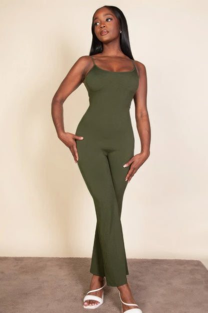 Ribbed sleeveless wide leg jumpsuit, this sophisticated piece features a soft, medium-weight rib knit fabric that provides a perfect blend of comfort and style