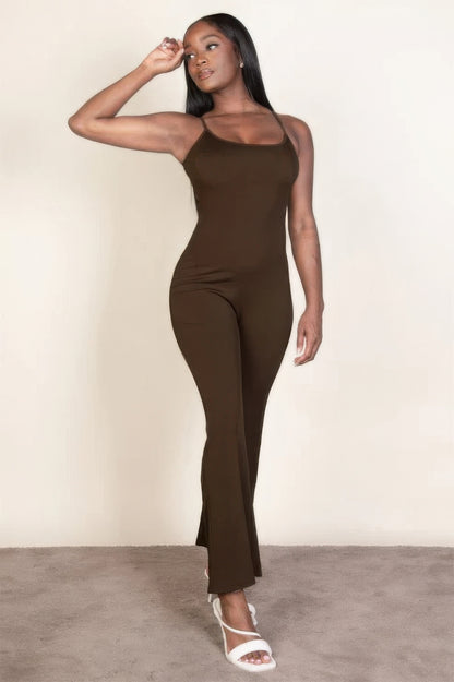 Ribbed sleeveless wide leg jumpsuit, this sophisticated piece features a soft, medium-weight rib knit fabric that provides a perfect blend of comfort and style