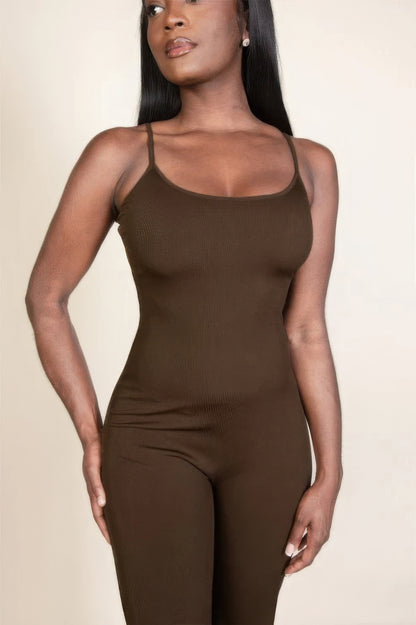 Ribbed sleeveless wide leg jumpsuit, this sophisticated piece features a soft, medium-weight rib knit fabric that provides a perfect blend of comfort and style