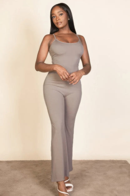 Ribbed sleeveless wide leg jumpsuit, this sophisticated piece features a soft, medium-weight rib knit fabric that provides a perfect blend of comfort and style