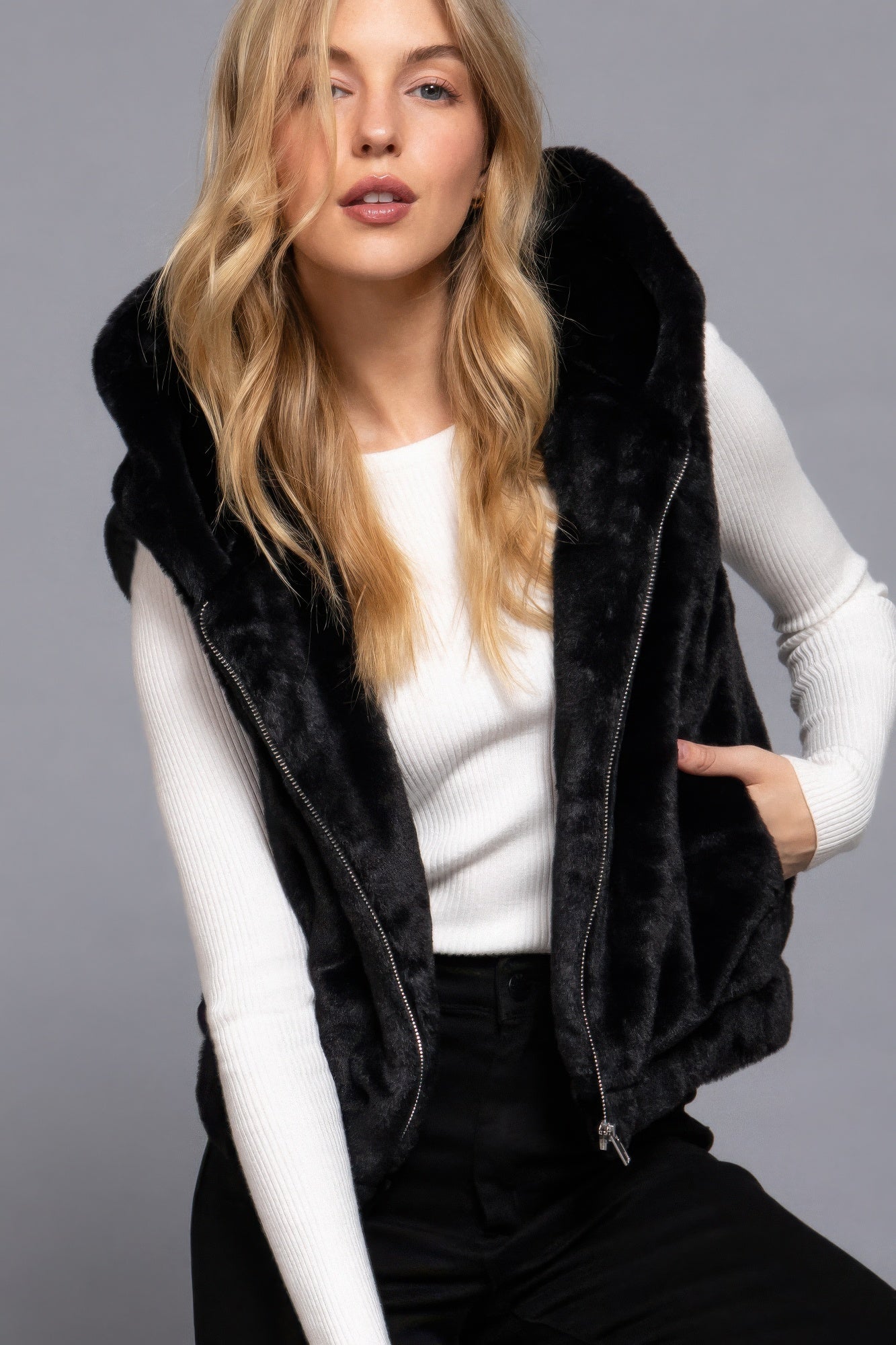 Hoodie Faux Fur Vest, stylish and cozy addition  designed to keep you warm