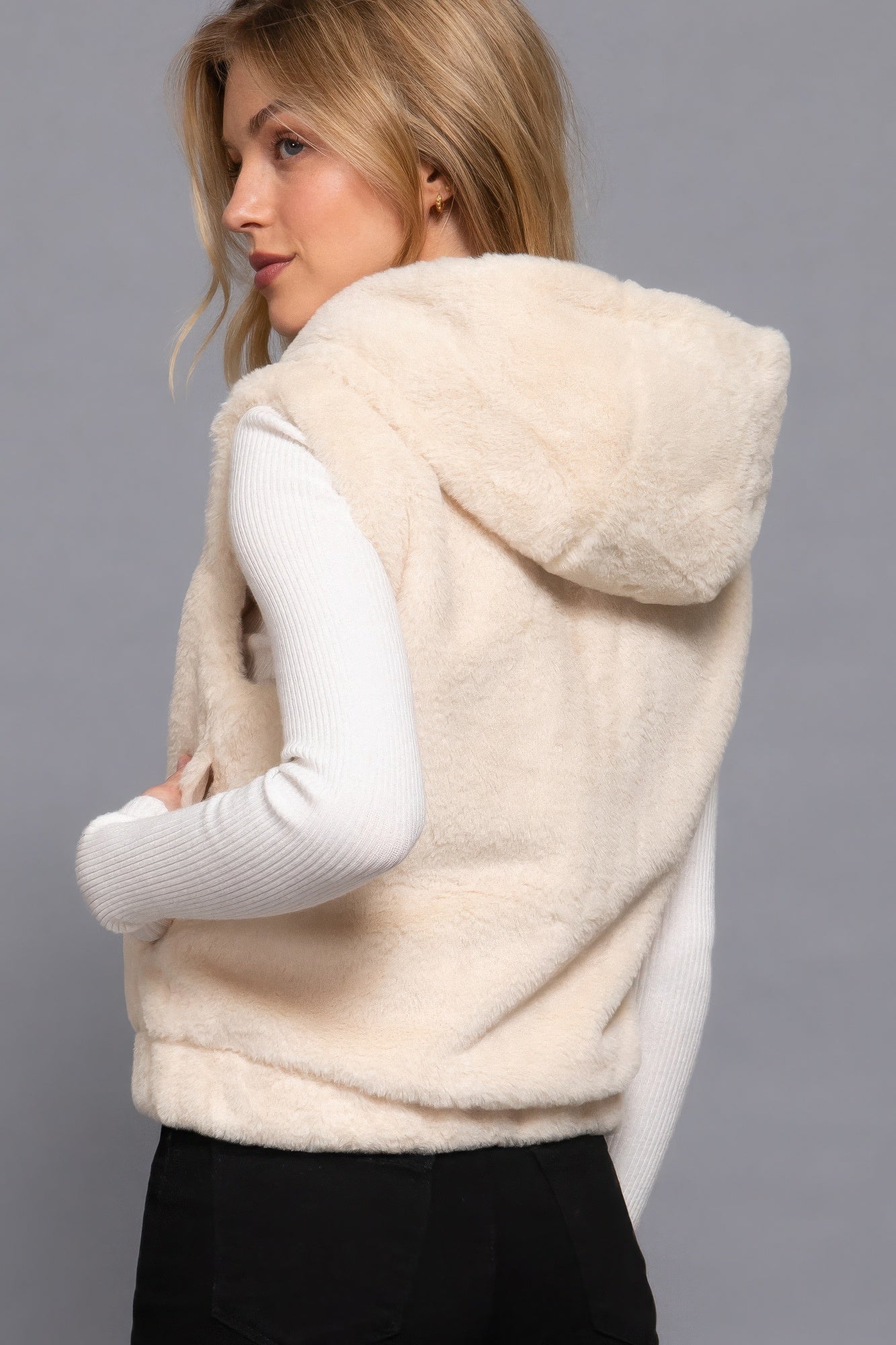 Hoodie Faux Fur Vest, stylish and cozy addition  designed to keep you warm